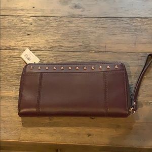 NWT burgundy Fossil wristlet